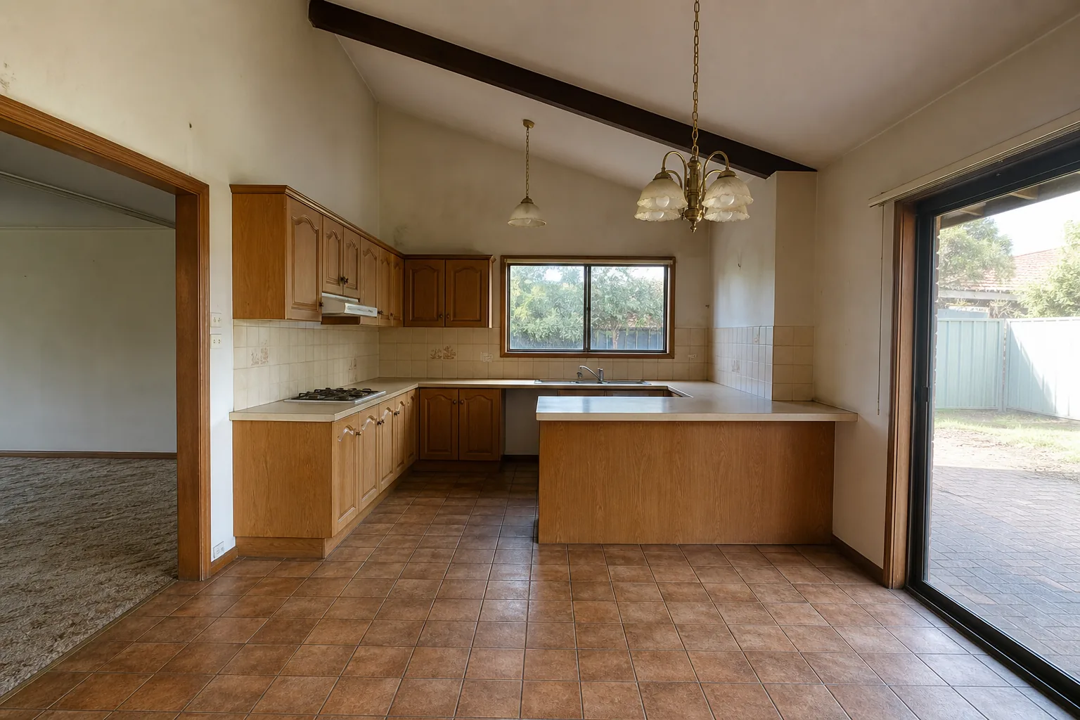 Representative 1980s suburban kitchen concept before renovation with timber cabinets